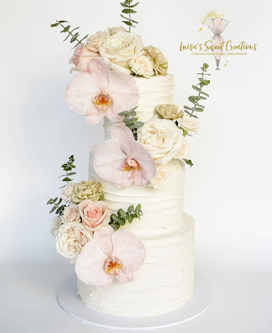3 tier wedding cake with orchids